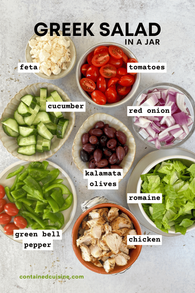 Traditional Greek Salad ingredients chopped and in small bowls.