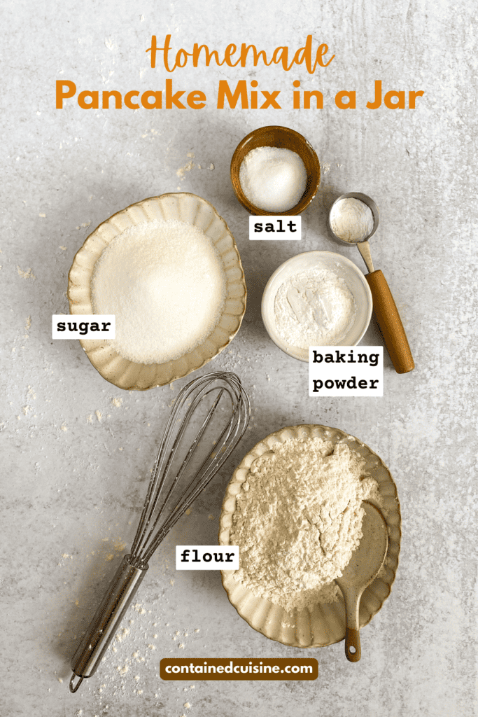 Bowl of pancake mix ingredients including flour, baking powder, sugar and salt.