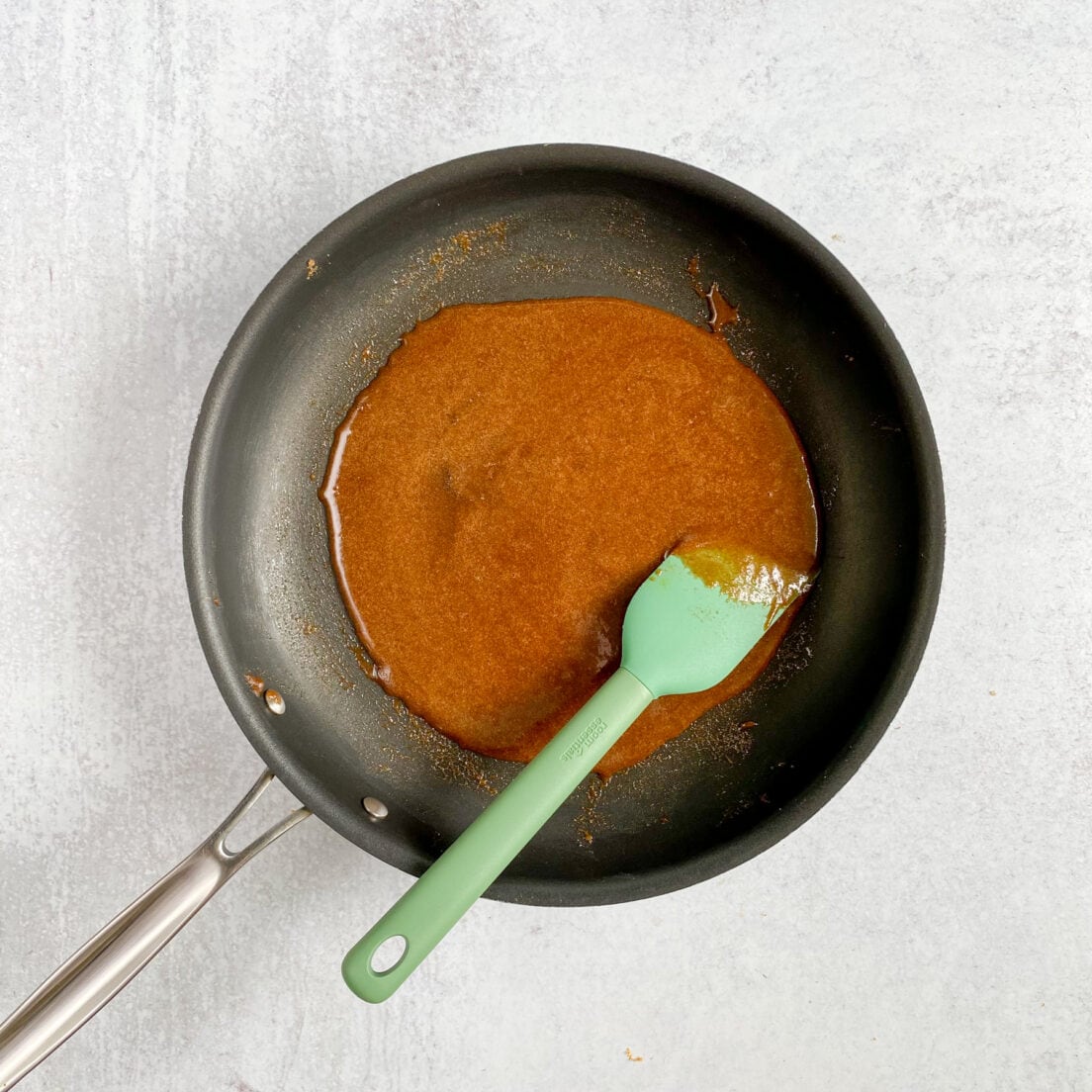 Cinnamon sugar glaze melted in pan.