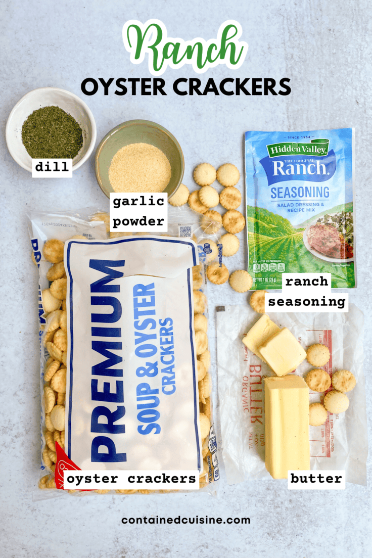 Overhead picture showing the ingredients needed to make ranch seasoned crackers, including bowls of dill and garlic powder, envelope of hidden valley ranch seasoning, stick of butter and bag of Nabisco oyster crackers.