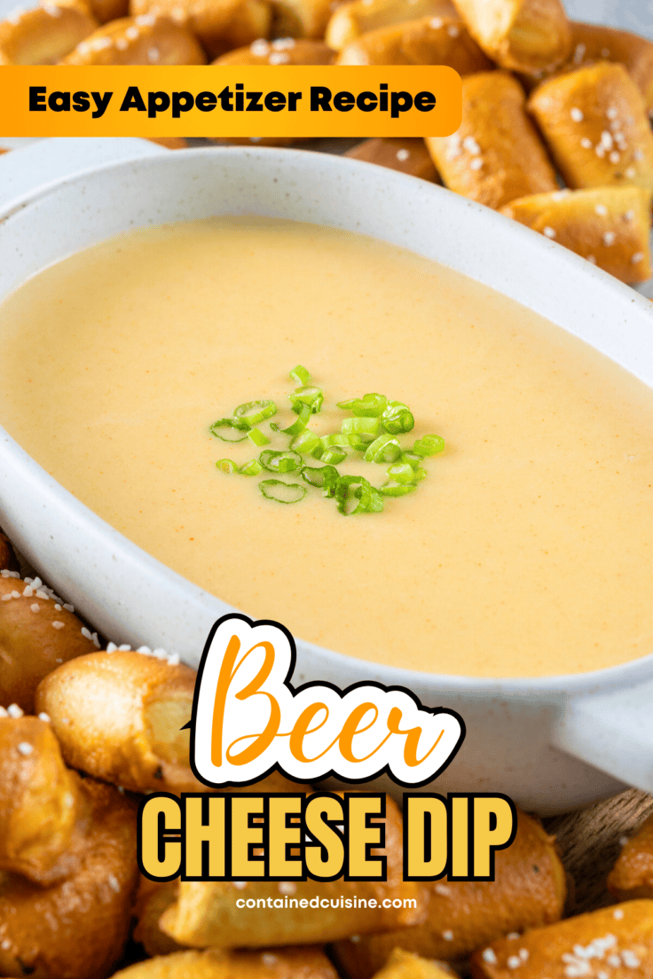 A bowl of homemade beer cheese dipping sauce on a tray loaded with pretzel bites. The image has the text overlay, easy appetizer recipe, beer cheese dip.