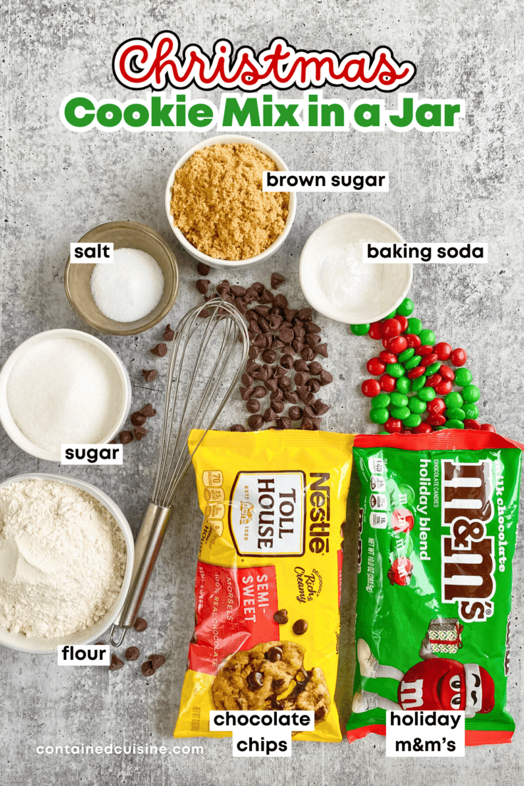 All the ingredients needed to make a mason jar Christmas cookie mix gift, in small bowls and open bags of Nestle chocolate chips and holiday m&m's.