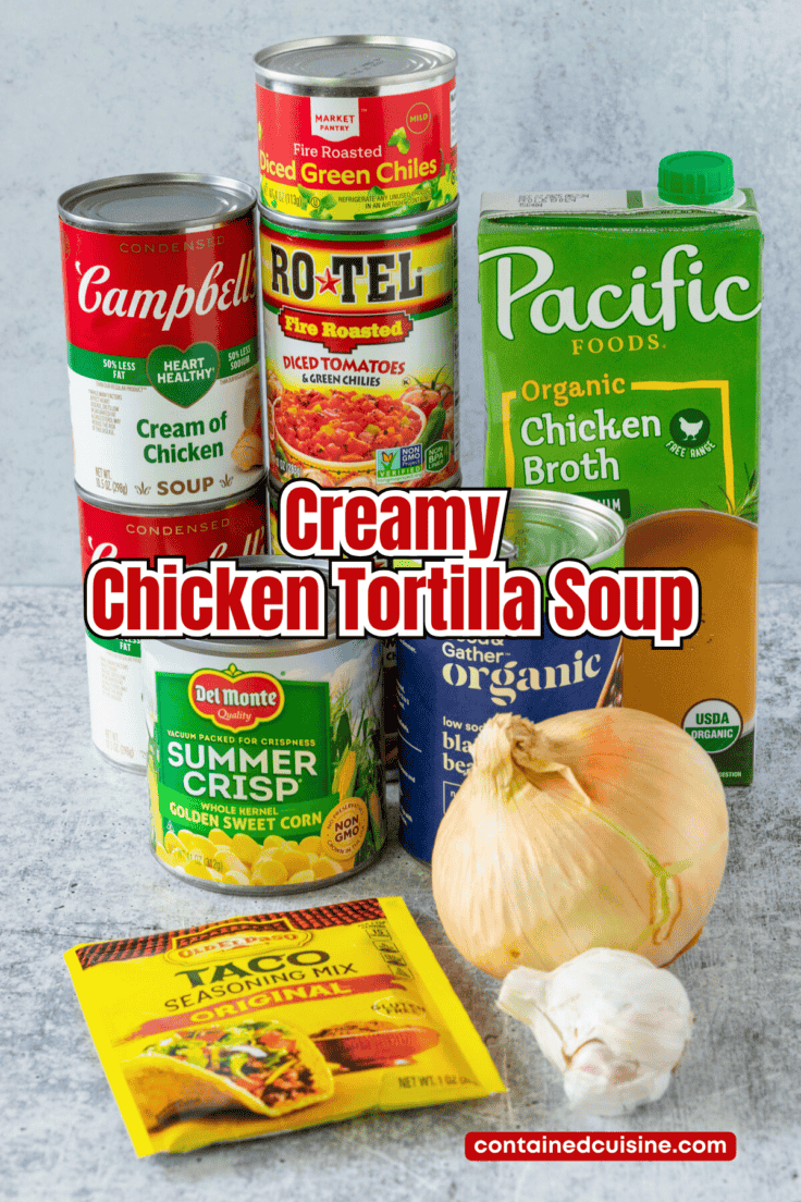 A picture of all the canned ingredients needed to make this recipe for creamy chicken tortilla soup, along with a carton of chicken broth,  packet of taco seasoning, an onion, and garlic. The picture has text overlay that says, creamy chicken tortilla soup.