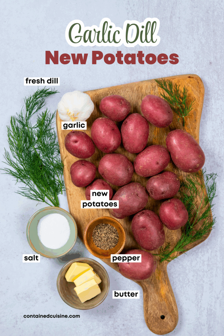 An overhead photo of the ingredients needed to make boiled garlic dill new potatoes. There is a bunch of fresh baby dill, a bulb of garlic, red baby new potatoes, salt, pepper and butter. The image has text overlay that reads, "garlic dill new potatotes."