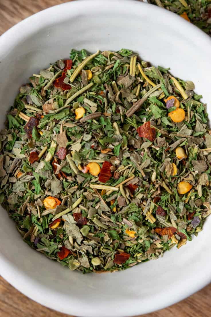 An overhead picture showing the spices all mixed together in a bowl. This Italian blend is colorful and has lots of texture.