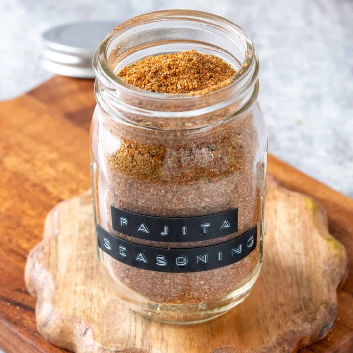 Labeled spice jar filled with homemade fajita seasoning spice mix.