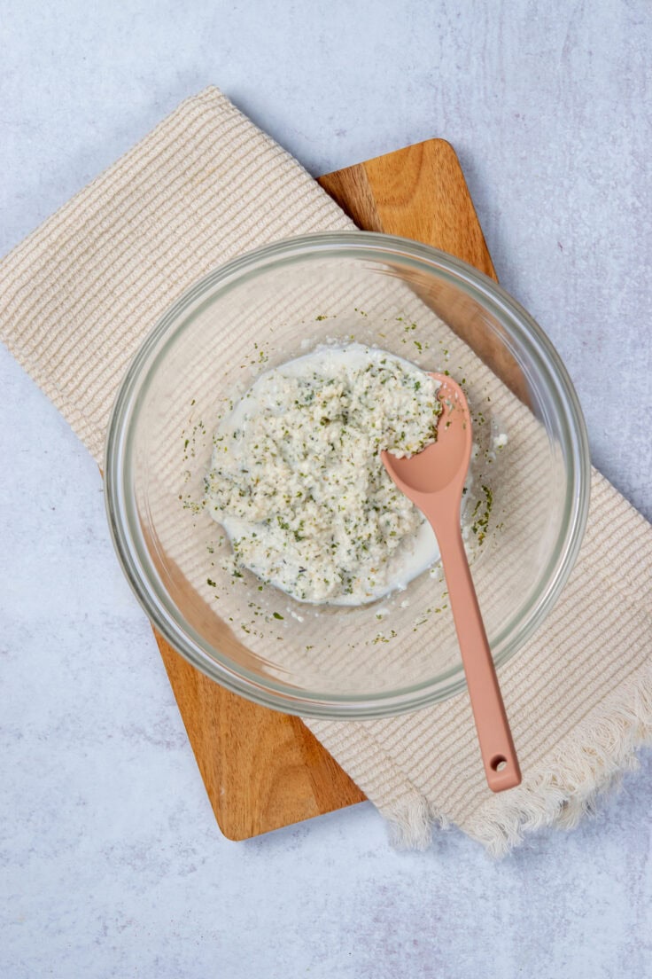 The bread crumbs have soaked up the milk and formed a paste which helps keep the baked meatballs tender, and also acts as a binder.
