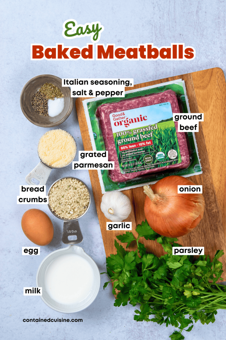 Overhead view of ingredients for baked meatballs including ground beef, Italian seasoning, bread crumbs, onion, garlic, parsley, parmesan cheese, milk, and an egg.