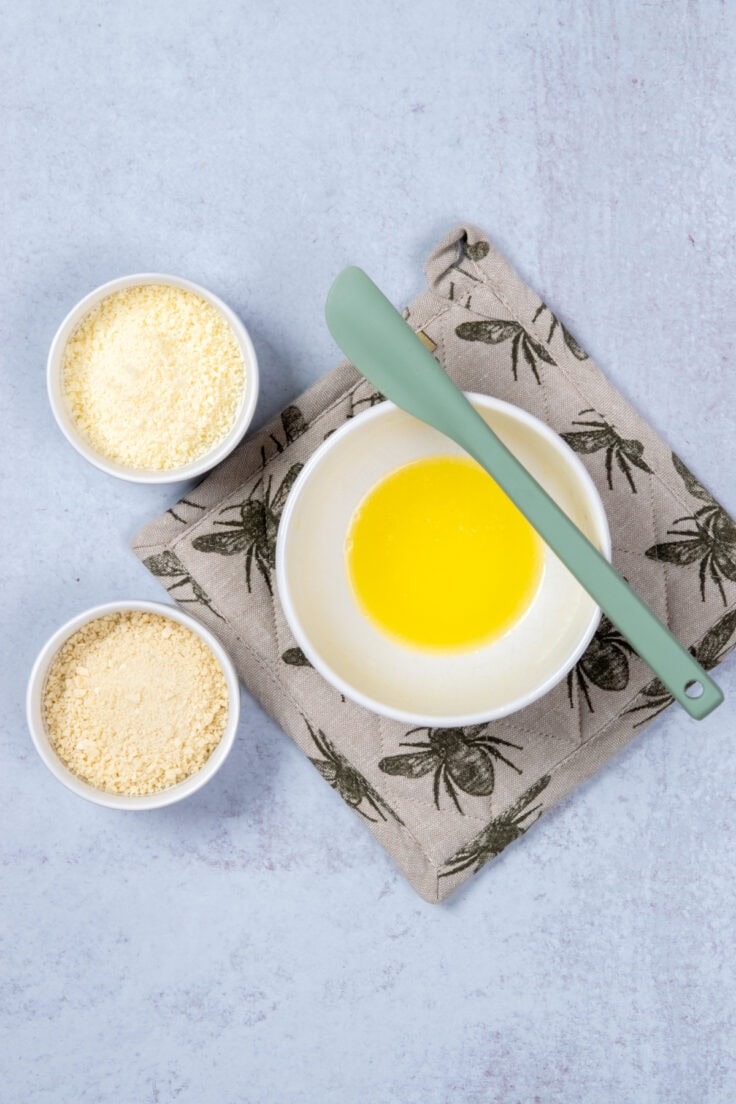 Panko breadcrumbs, grated parmesan and melted butter for making the casserole topping.