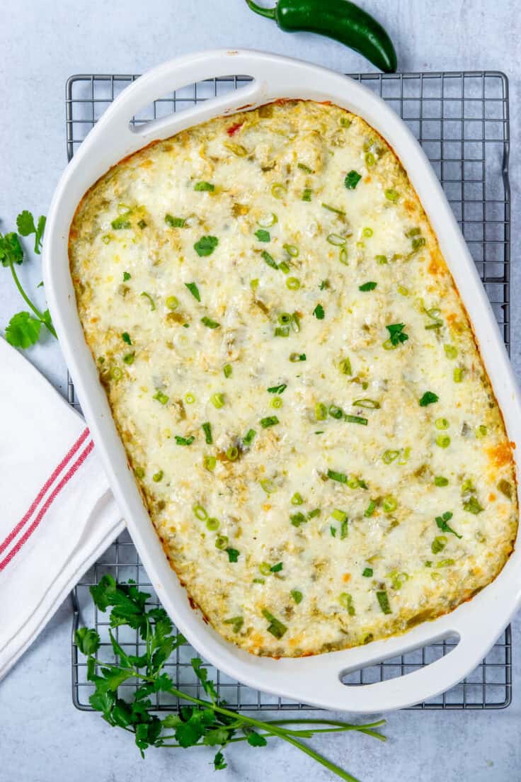 Baked green chicken enchilada casserole fresh from oven.