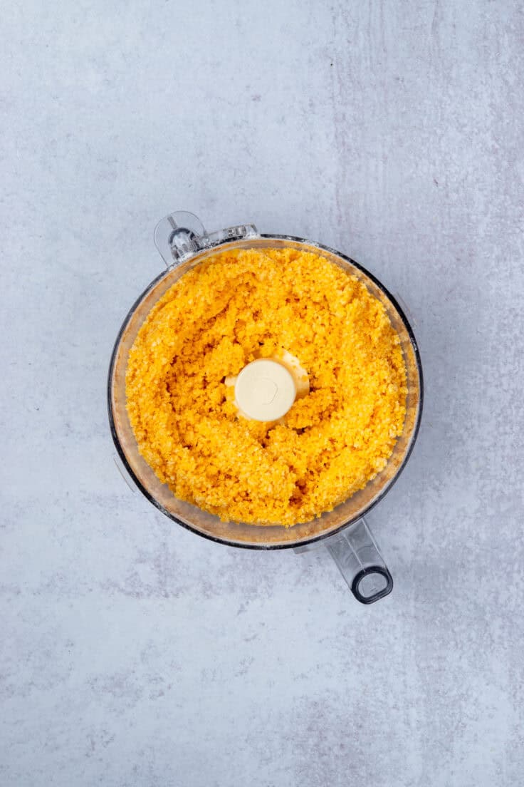 Water added to Cheez-Its mixture in food processor and pulsed to resemble course wet sand.